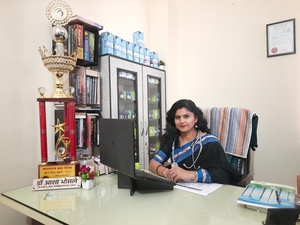 Dr.  Asha Bhosale